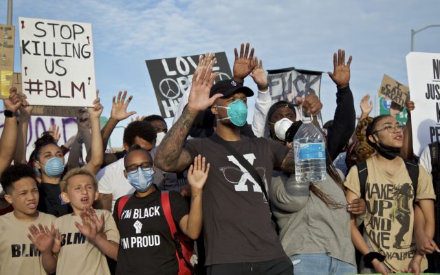 Damian Lillard walks with Protestors at Black Lives Matter march in Portland