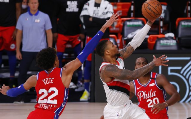 Lillard with 51 points in 124-121 win over Philly